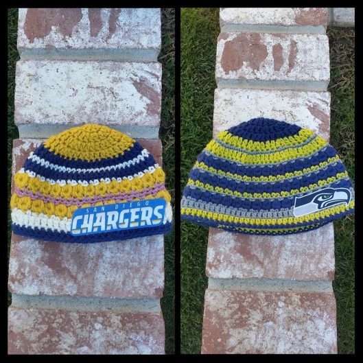I designed this hat for my friend's daughter.  I've since been working on instructions for it in different sizes.  The Chargers hat is 6-12 months and the Seahawks hat is a large adult size.